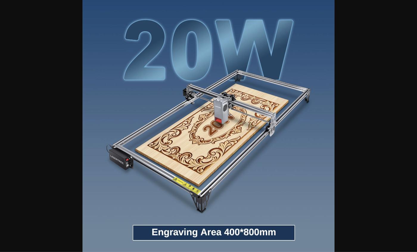 The LaserTree K1 Mini Plus 20W laser engraver actively engraving an ornate decorative pattern on a large wood plank — showing the extended 400×800mm working area and the machine's full horizontal reach.