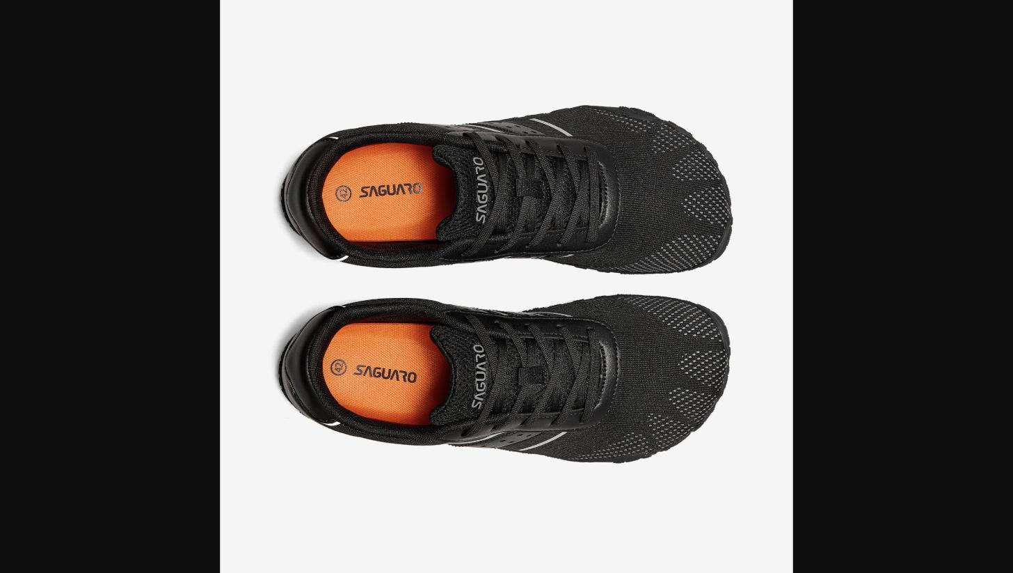 The Ground from above — the five-toe silhouette and orange-accented insole are visible through the open top, showing the wide toe box and the split-toe construction that lets each toe splay naturally.