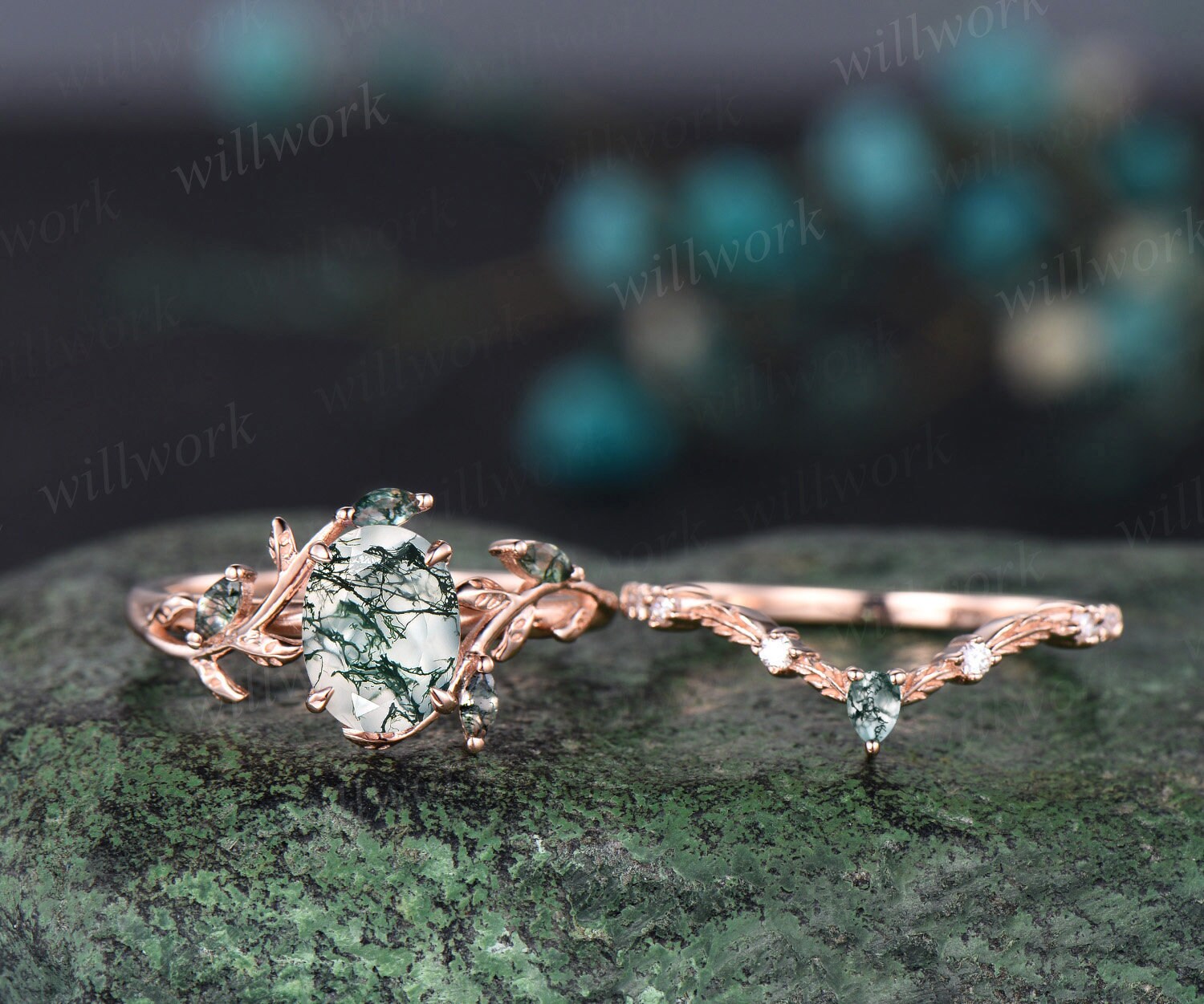 The set worn on a hand, showing the true scale of the 6x8mm oval center stone against the curved wedding band
